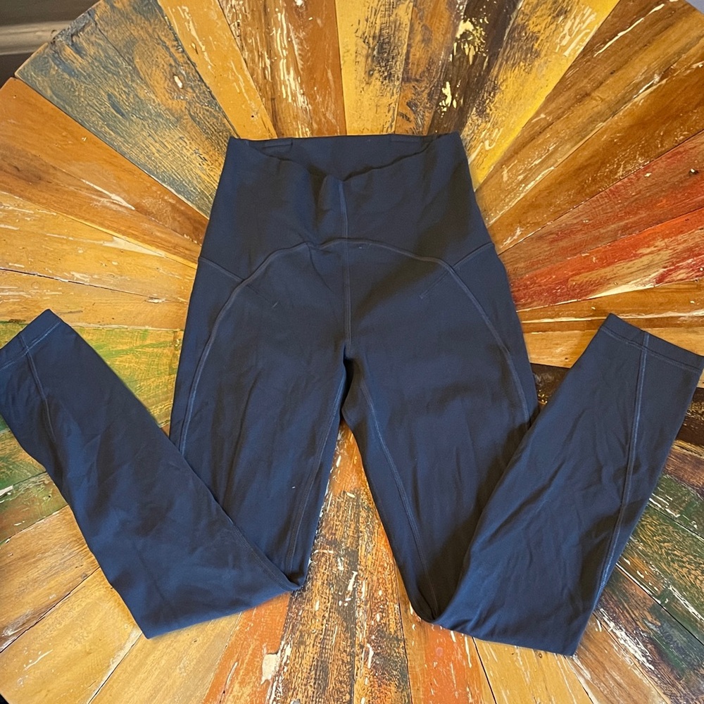 Lululemon In Motion High-Waisted Leggings, size 2 - 25”